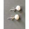 white pearl stud earring.png