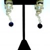 Gold Carolina earrings black pearl.png