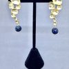 black pearl gold Carolina earrings.png