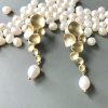 gold earrings white pearl.png